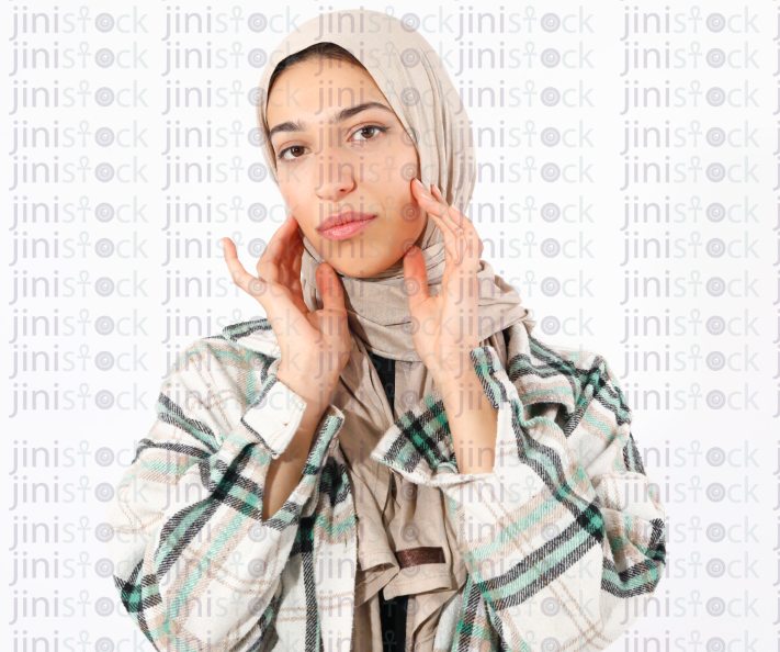 Beauty portrait of an attractive woman looking at camera isolated