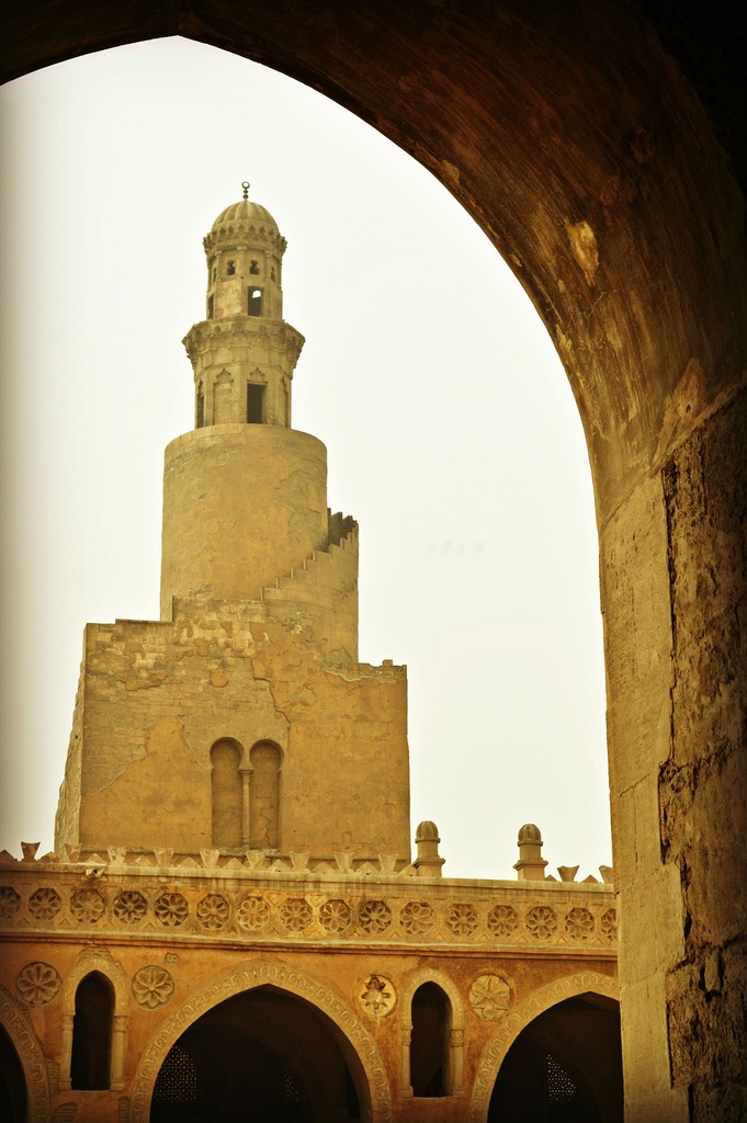 Mosque minaret seen through a window - stock image