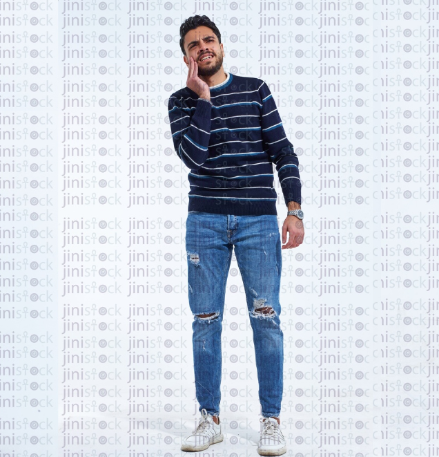 young man with toothache standing in full length