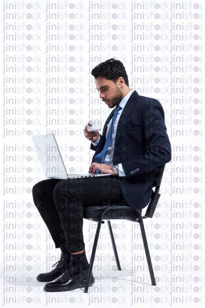 employee working while drinking tea or coffee