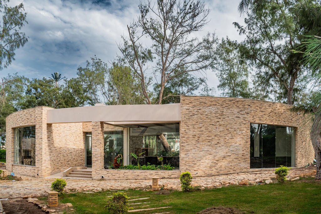 house of stones in the garden stock image