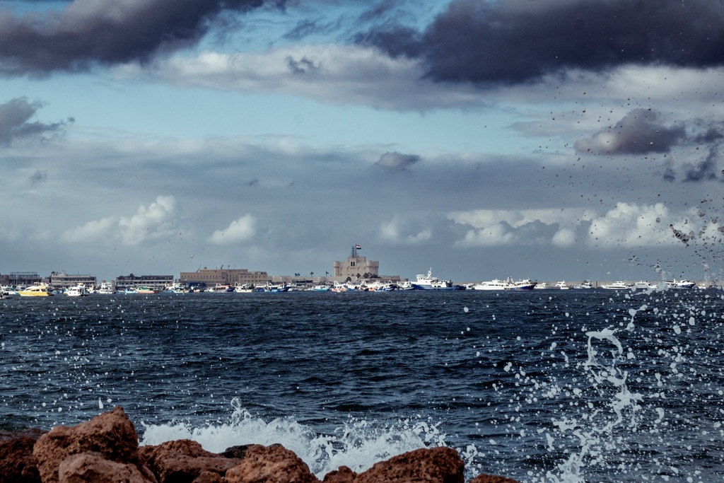 Clouds over Qaitbay Citadel - distance photo - stock image