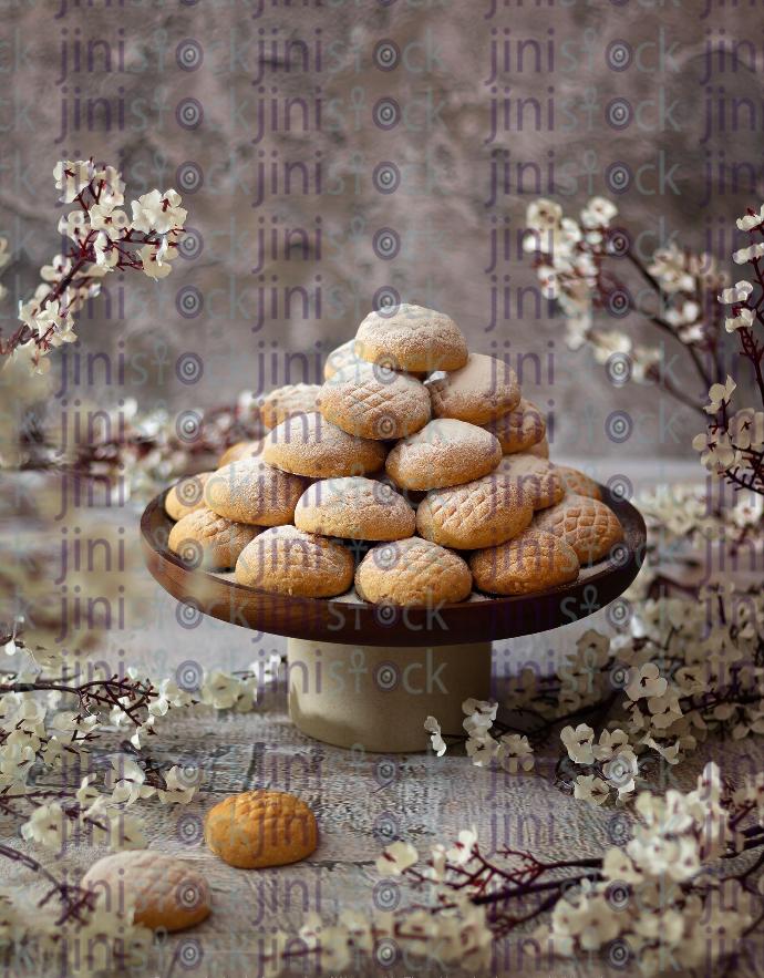 A STOCK IMAGE OF SOME EID KAHK DESSERT TOPPED WITH SUGAR