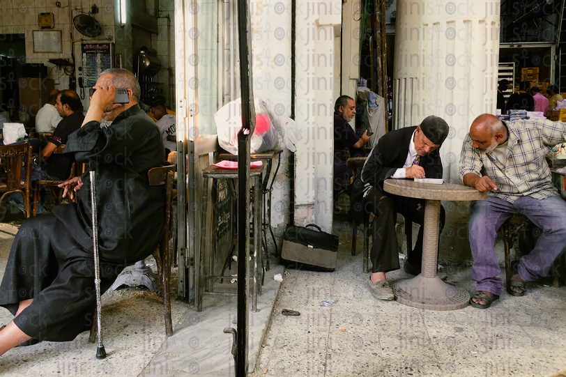 people sitting in an oriental coffee shop