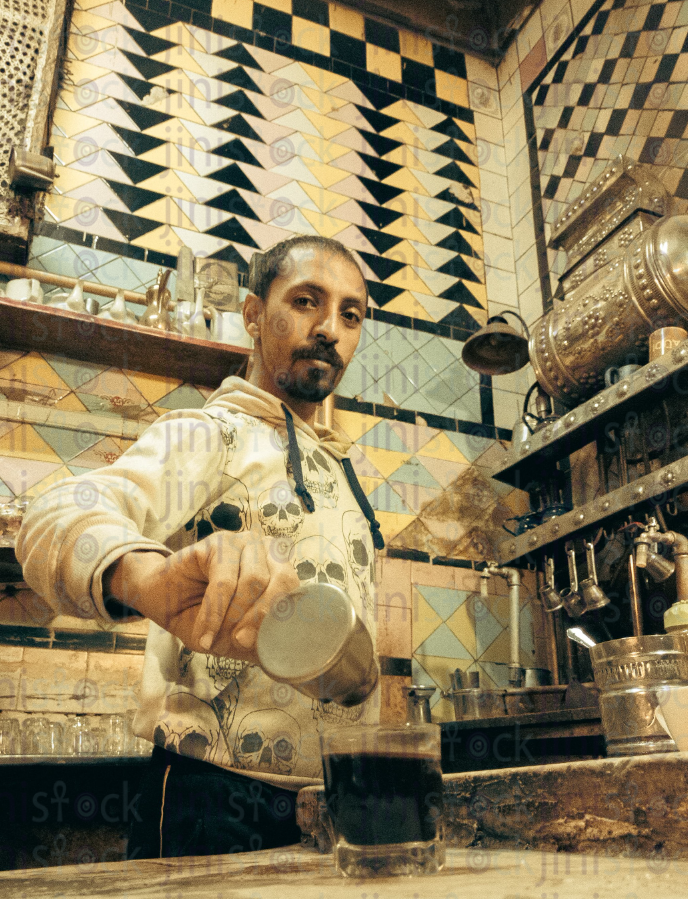 Man in a baladi coffee shop