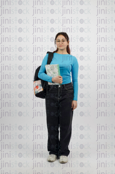 Girl holding a book - stock image