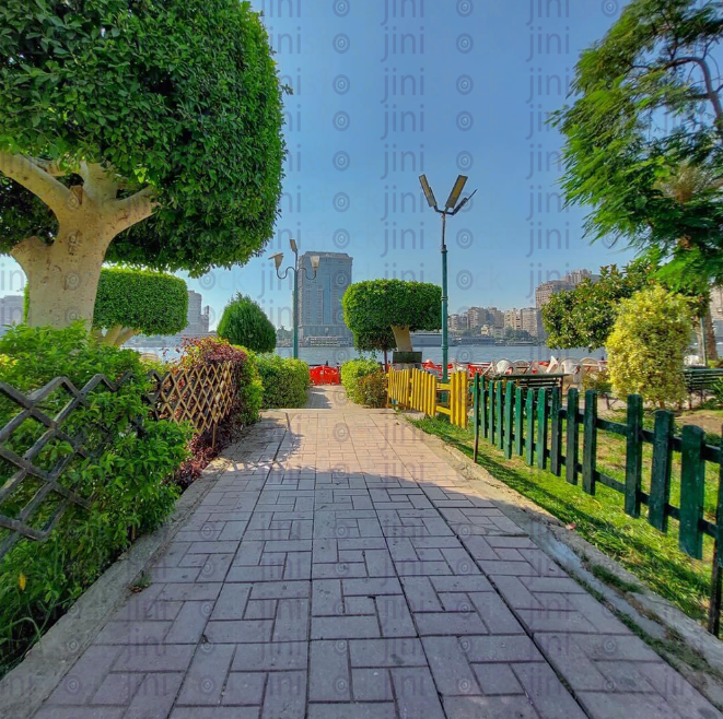 road in the garden entrance and a good nature view. eid environment. park for kids. green landscape.