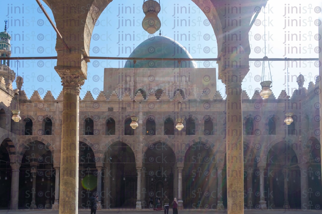 the nasr mosque green top through the arch