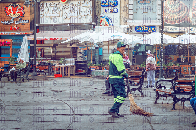 retouched picture for the street cleaner working