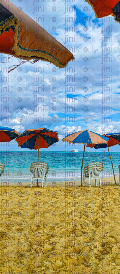 Plastic Chair on the Beach in a summer day  stock images