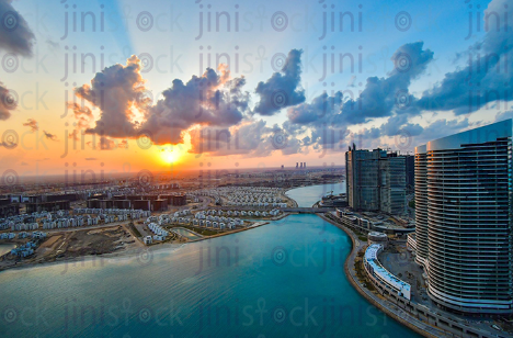 Towers of El Alamin City in Egypt during sunrise.