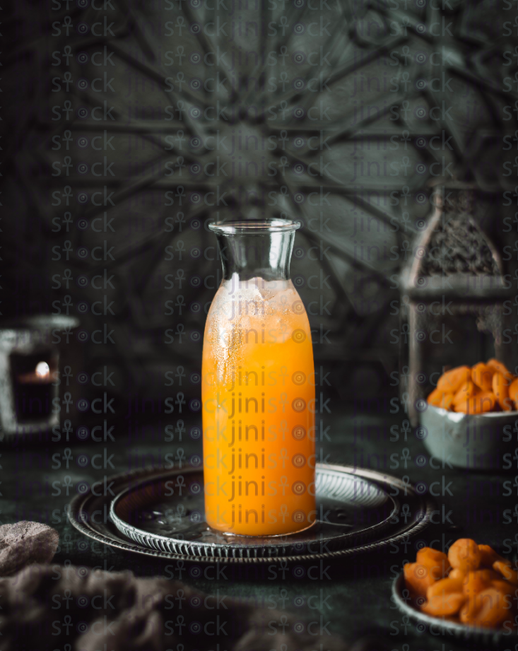 Omar el deen juice in a glass bottle