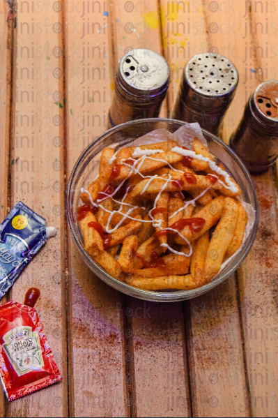 French fried on a blow with mayonnaise and ketchup- stock image