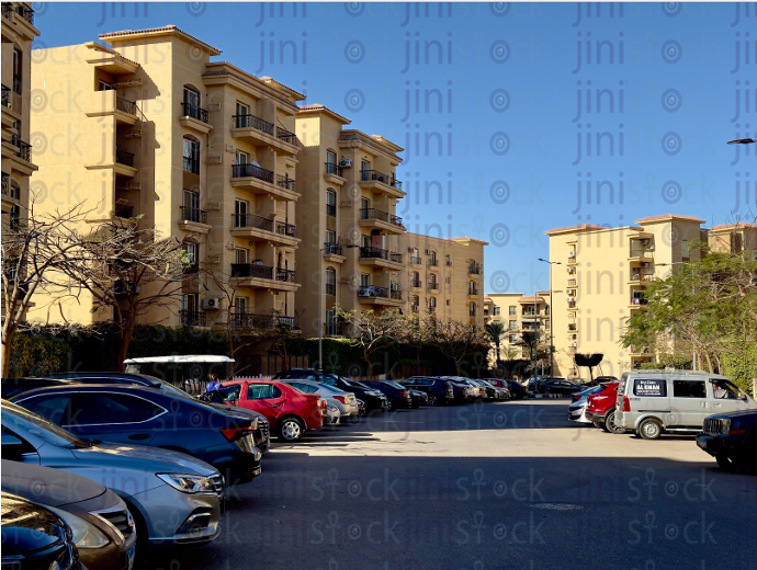 road in a compound where cars parked stock image