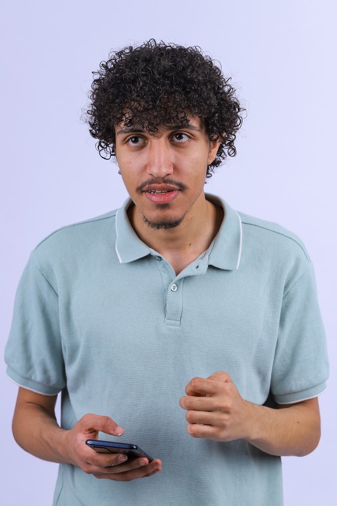 young man with curly hair.