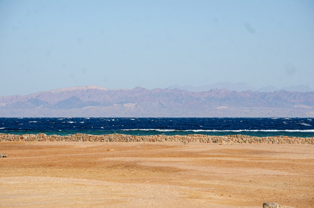 Sandy beach on the sea shore.