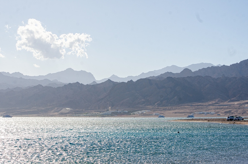 Mountain chains over the sea shores.