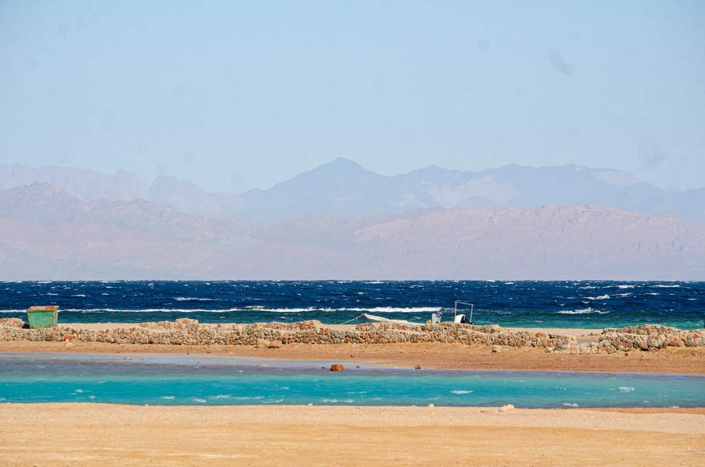 background for the lagoons and the dark sea water and the mountains.