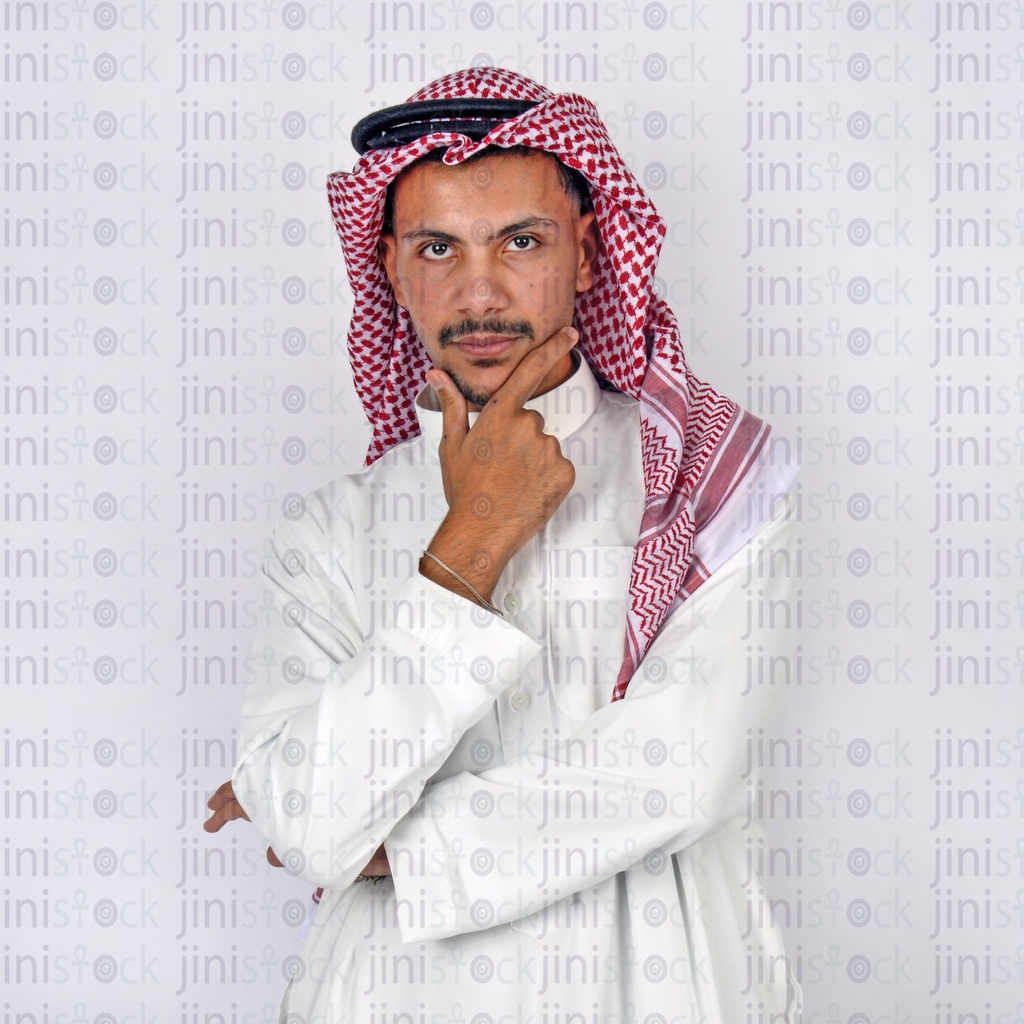 A model wearing khaliji uniformعارض أزياء يرتدي ملابس خليجية- stock image