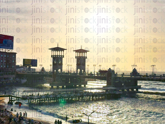 stanley bridge over the white sea during the sunset - stock image