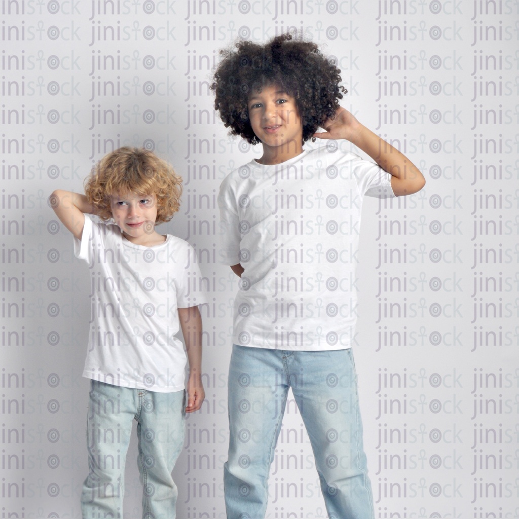 Two curly hair little boys smiling