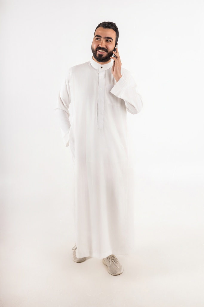 khaliji man talking on phone stock image