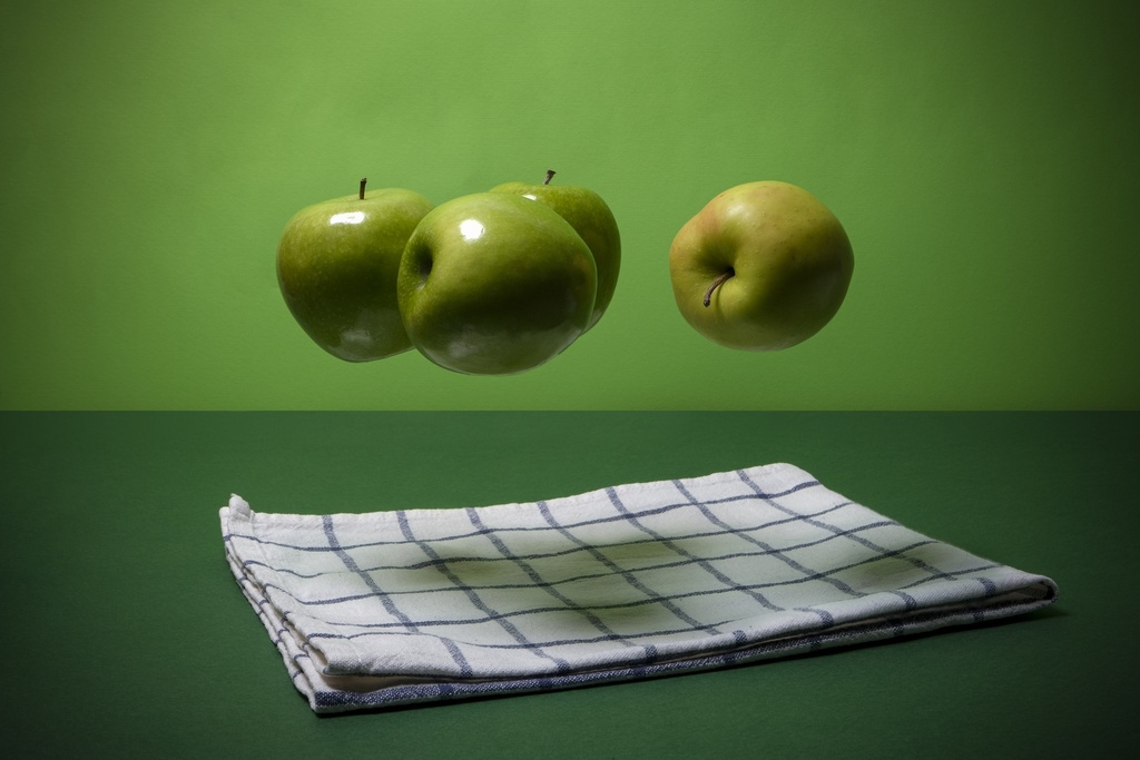 Floating green apple