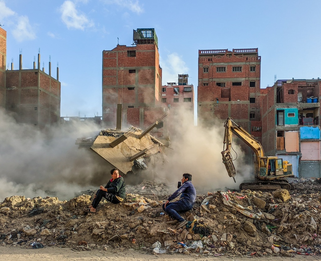 kids setting over a runed buidling