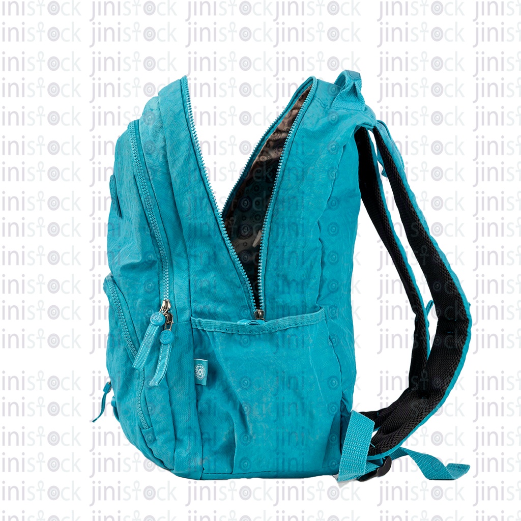 backpack open side view | Jini Stock