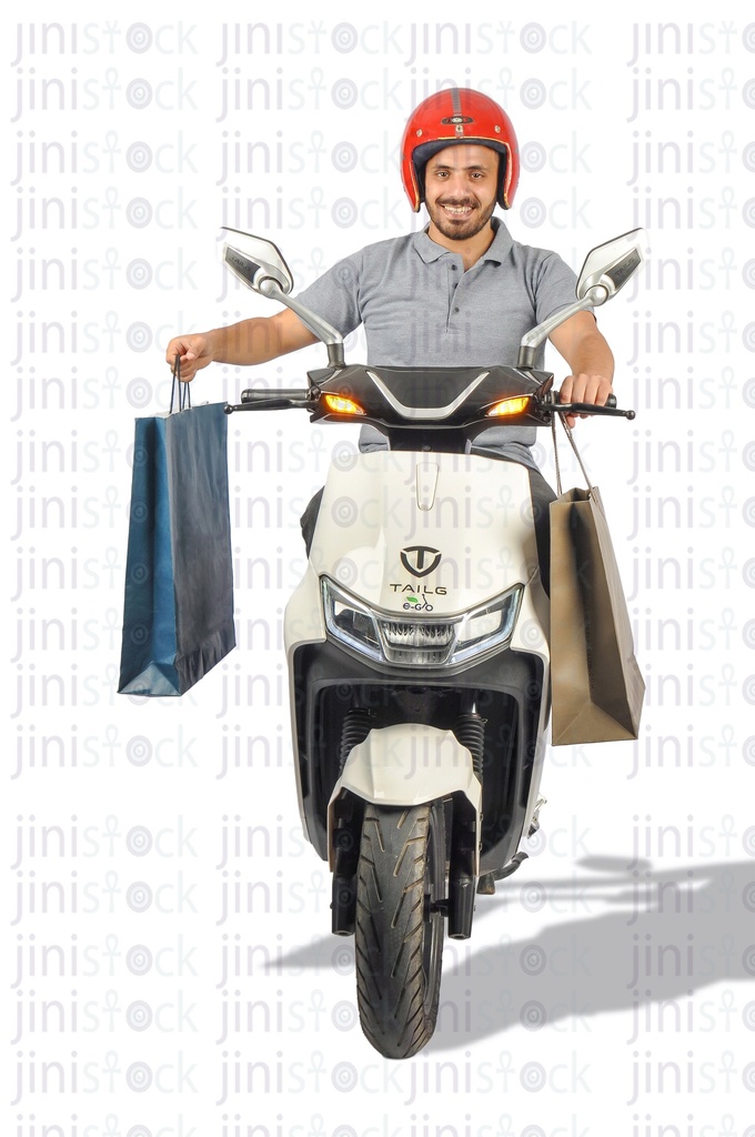 A male courier wearing red helmet and riding a white scooter and holding two bags