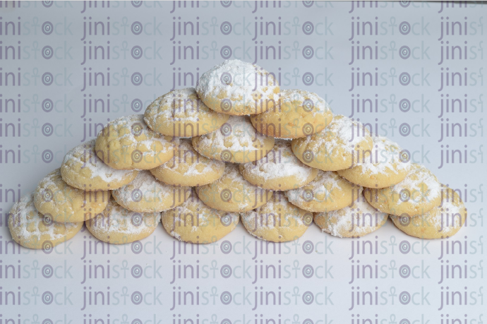 pyramid of kahk with sugar - stock image