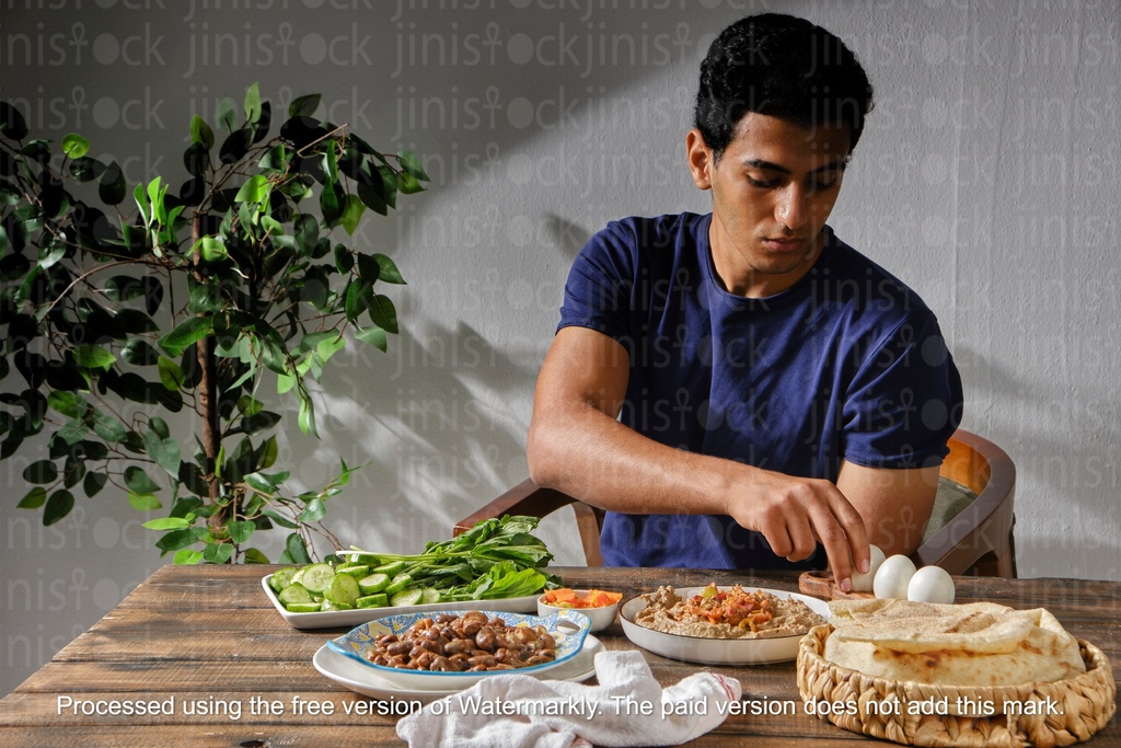 young man eating breakfast