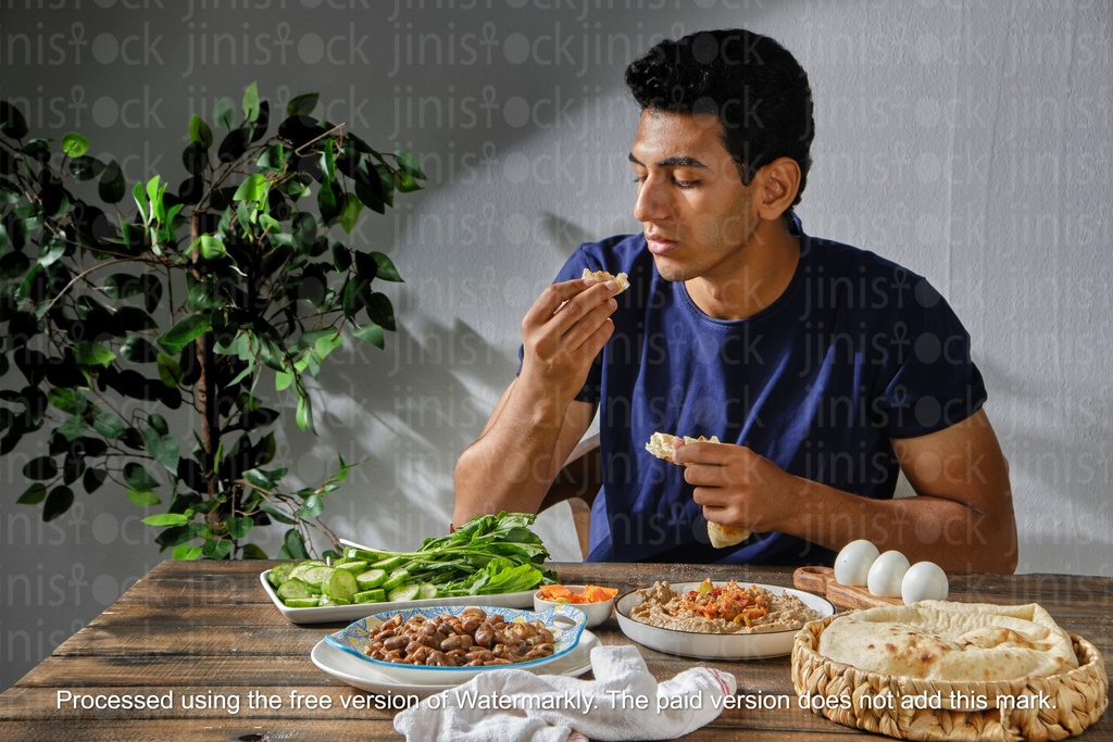 man enjoying Egyptian breakfast