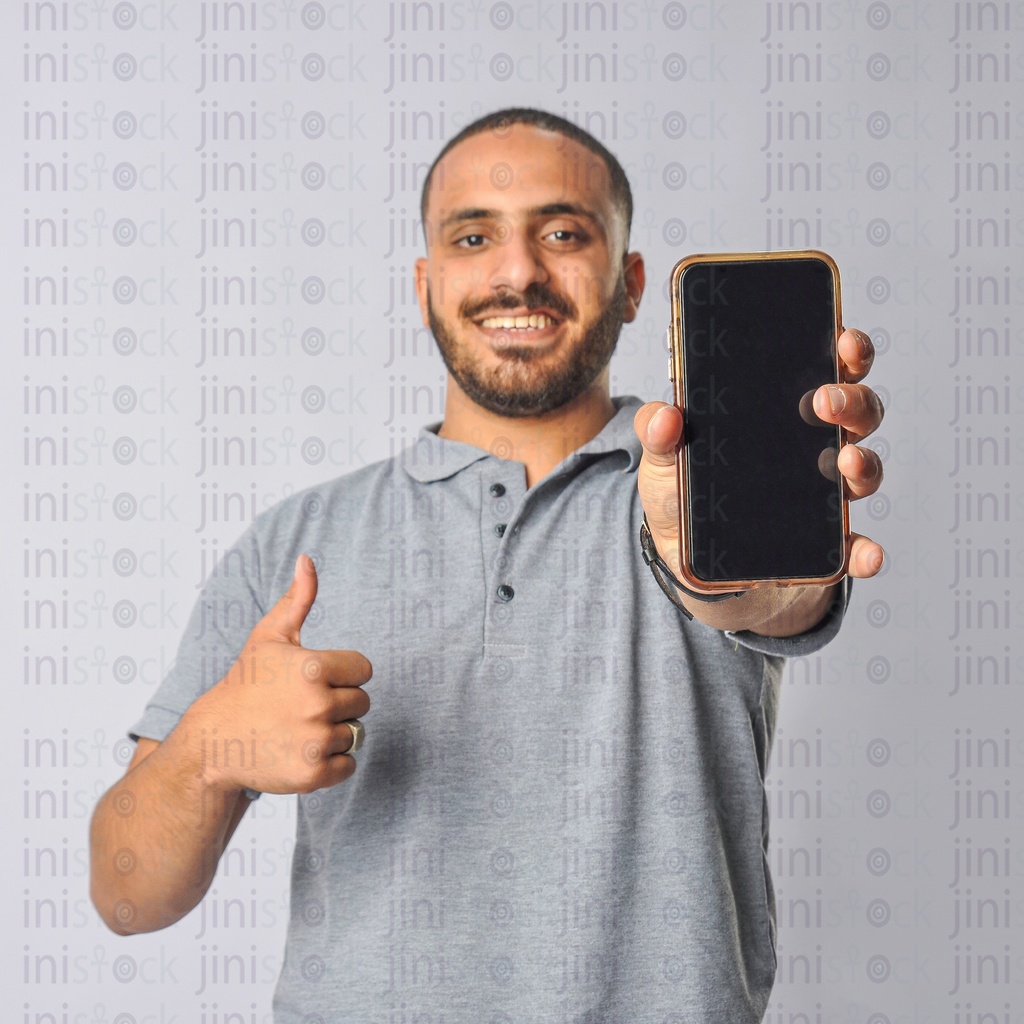 A person holding a mobile recommending a mobile application