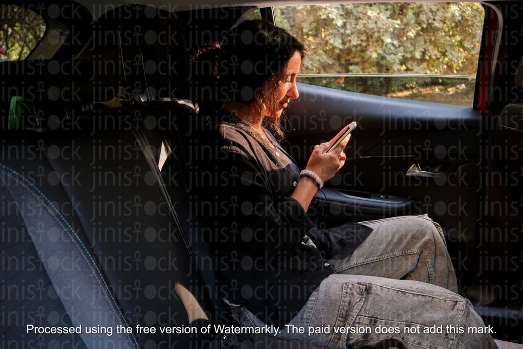 Girl in the back seat of a car