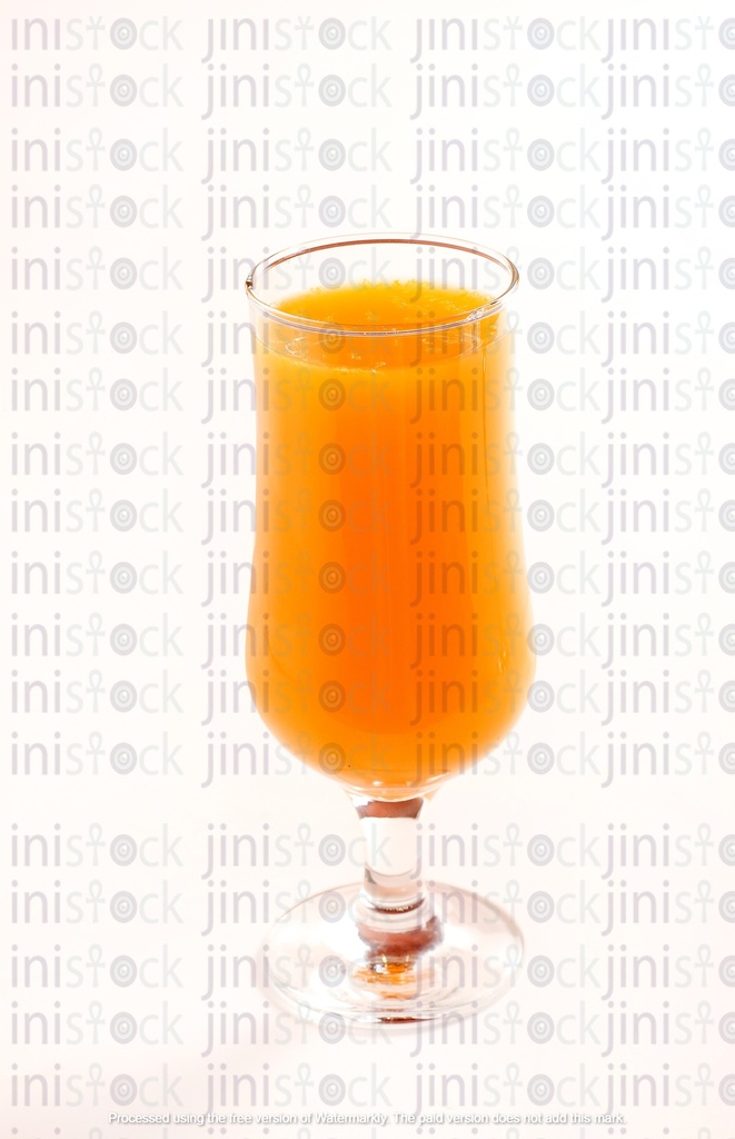 Carrot juice in an elegant glass cup