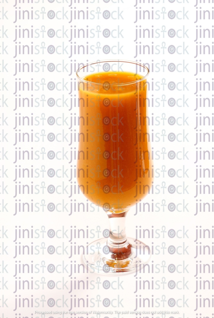 Mango juice in an elegant glass cup