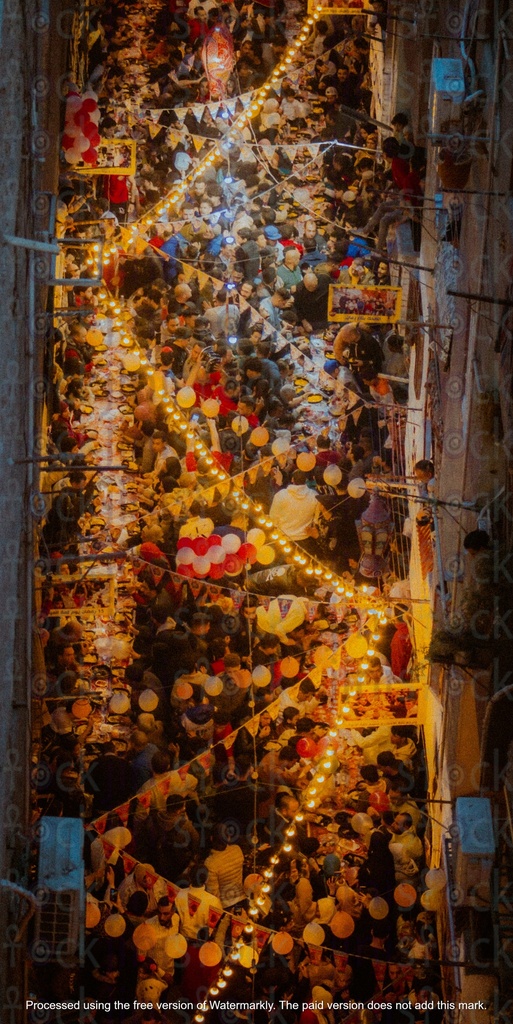 crowd celebrating ramadan with lights