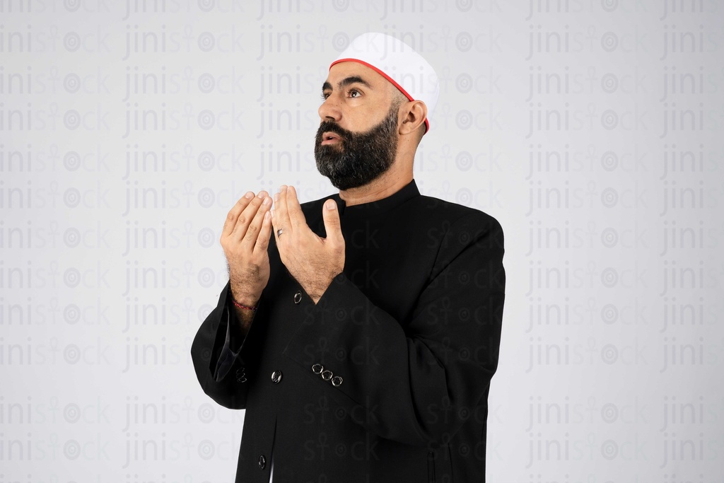 portrait for a Muslim sheikh praying with doaa