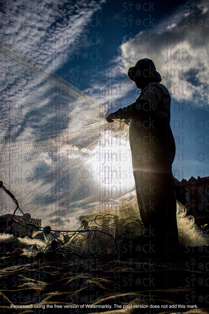 fisher man with fish net