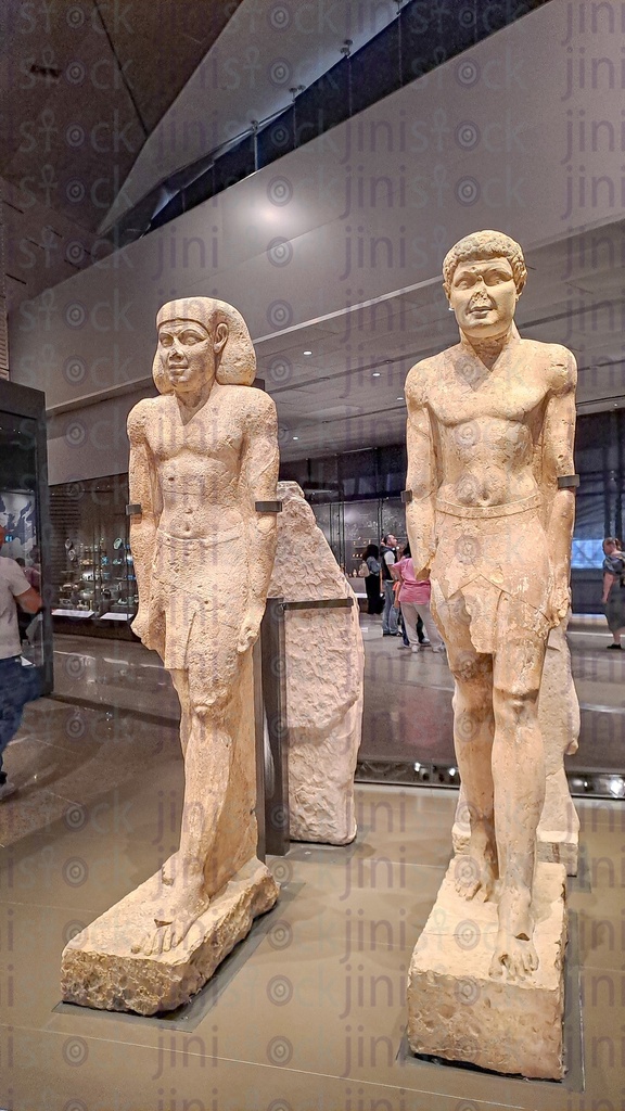 Two pharaonic statues in the grand Egyptian museum.