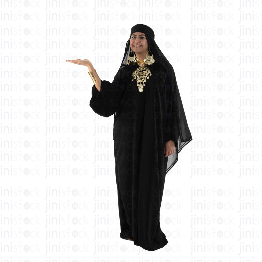 woman from upper egypt holding something in her hand