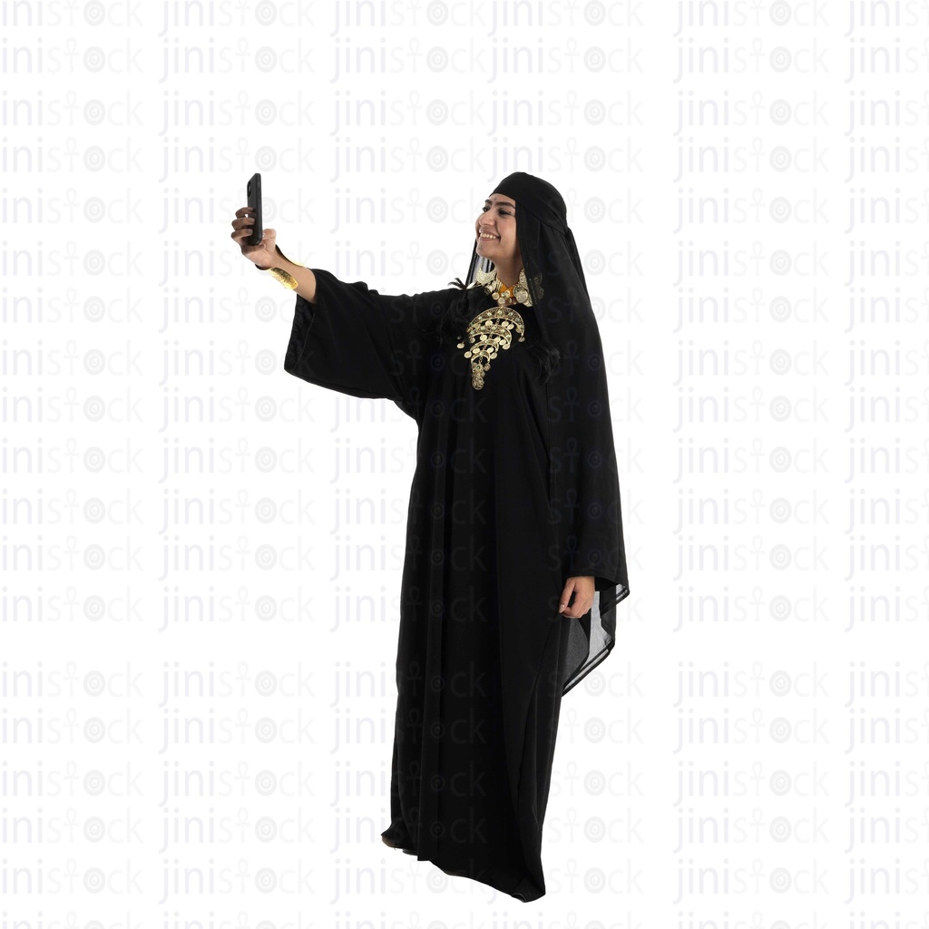 Upper Egypt woman taking a selfie with her phone