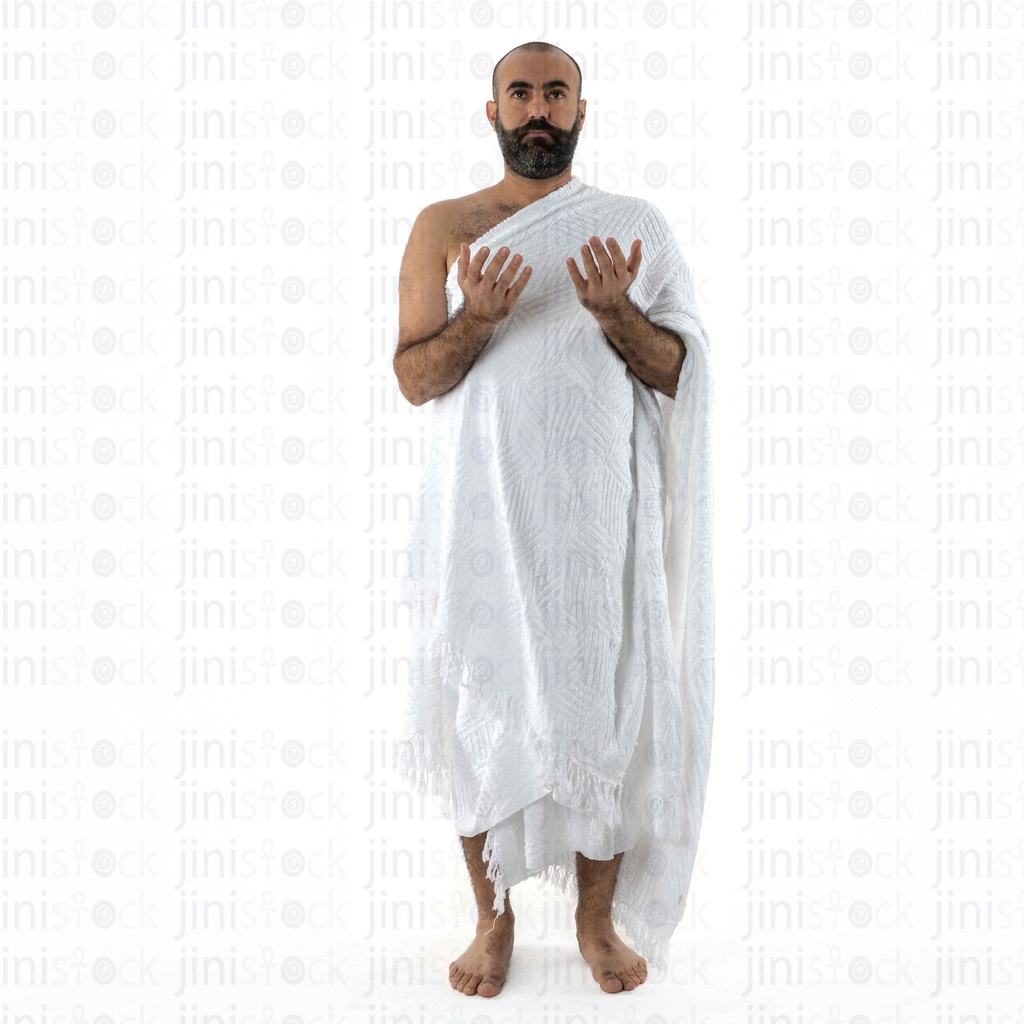 Man praying in umrah cloth