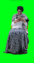 grandmother knitting and holding a mobile with green screen