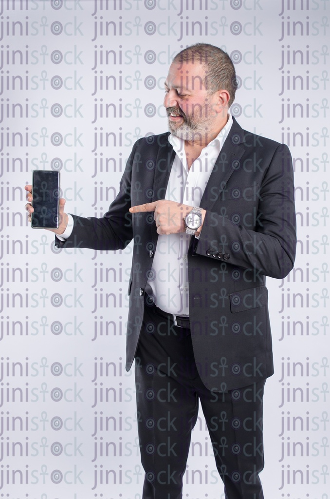 businessman pointing at a mobile