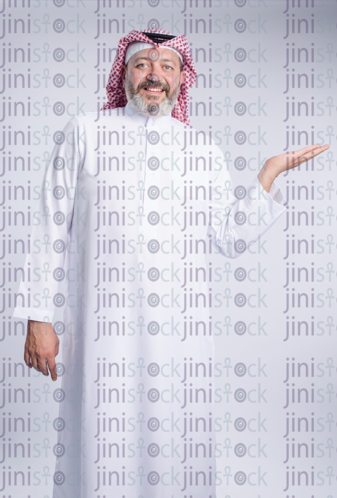 khaliji man holding a product