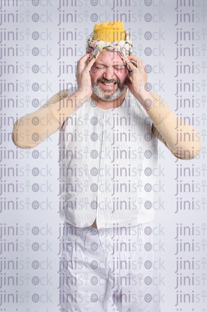 Egyptian farmer with headache