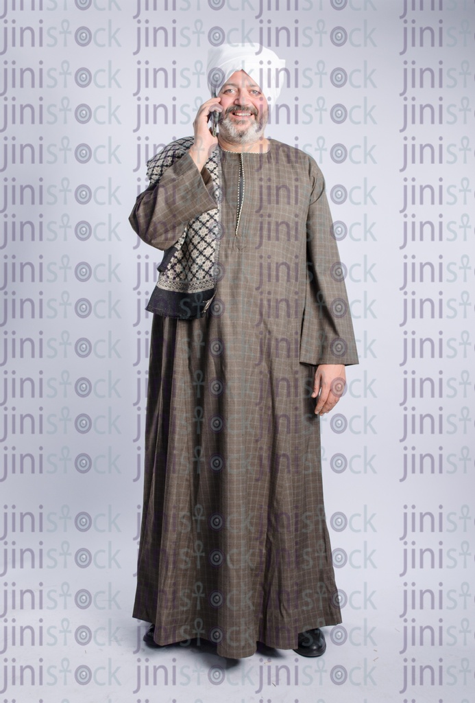 Egyptian man from upper egypt talking on the phone