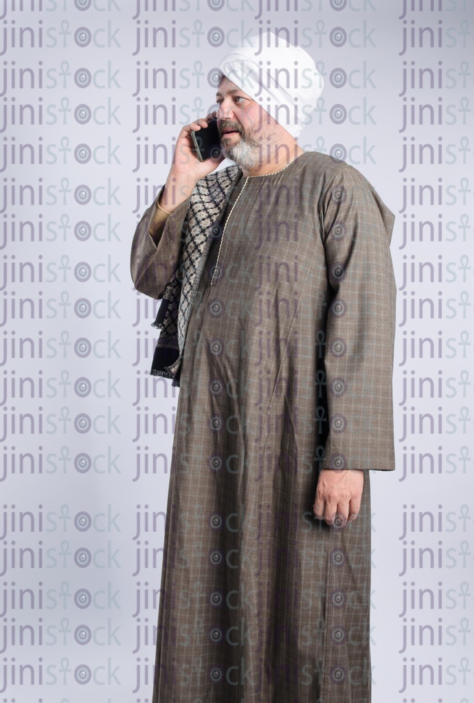 Man from upper egypt talking on his mobile